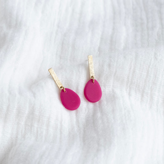 Fushia oorbellen met goud